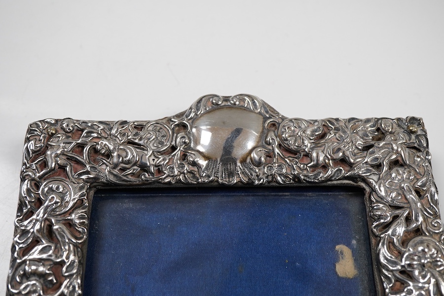 A George V repousse silver mounted rectangular photograph frame, maker's mark rubbed, London, 1911, 18.3cm.